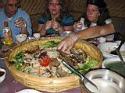 /uploadedImages/China_Odyssey/China_Trip_2009/lisu food eaten with hands.JPG
